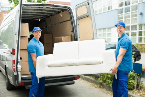 Removals van serving a Fitzrovia street with central London properties