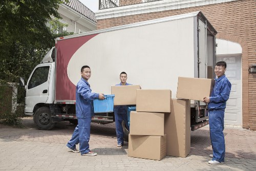Local movers handling a flat removal near Fitzrovia buildings