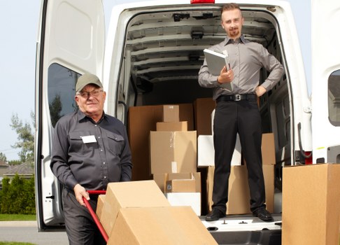Office relocation planning in Fitzrovia with moving boxes and desks