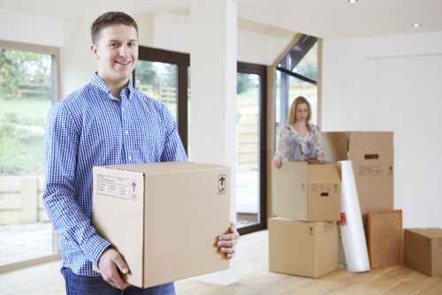 Careful loading of household items for removals near Fitzrovia