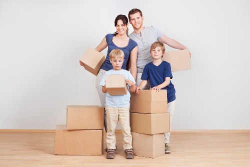 Moving team loading boxes and furniture for a Fitzrovia relocation