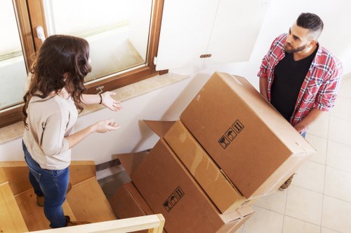 Packed boxes and furniture ready for a Fitzrovia move